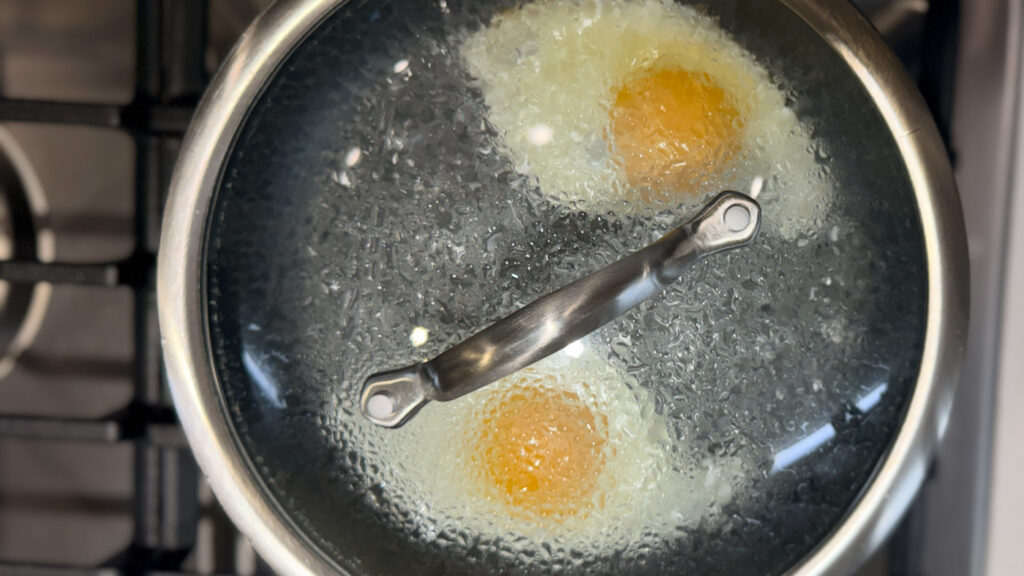 two eggs steam cooking