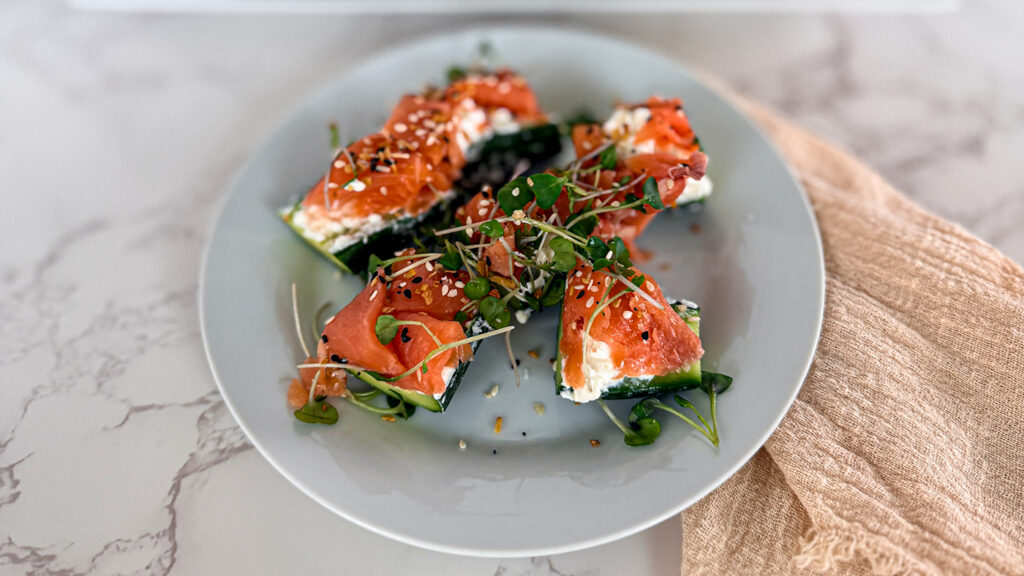 Low Carb 'Sushi' Alternative, cucumber, salmon, micro greens close up meal