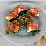 Low Carb 'Sushi' Alternative, cucumber, salmon, micro greens close up meal