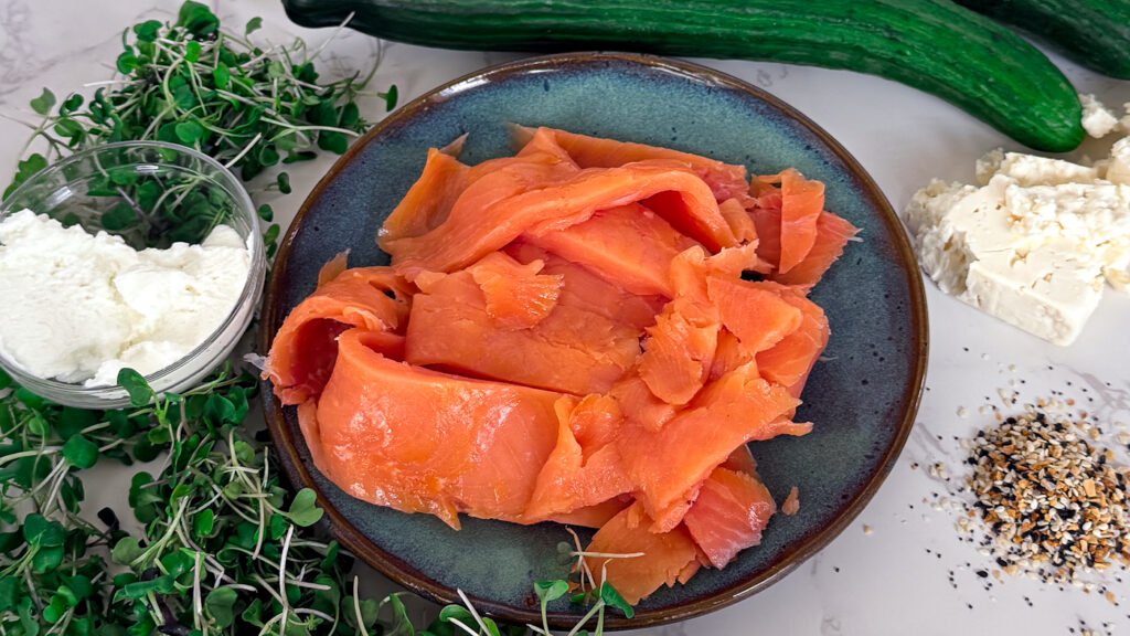Salmon, micro-greens, everything bagel seasoning, feta, Greek Yogurt. Simple ingredients, gourmet taste.