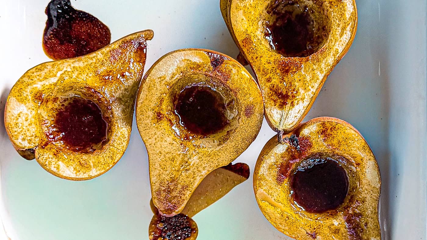 Fresh Bosc pears drizzled with maple and olive oil, ready to serve.