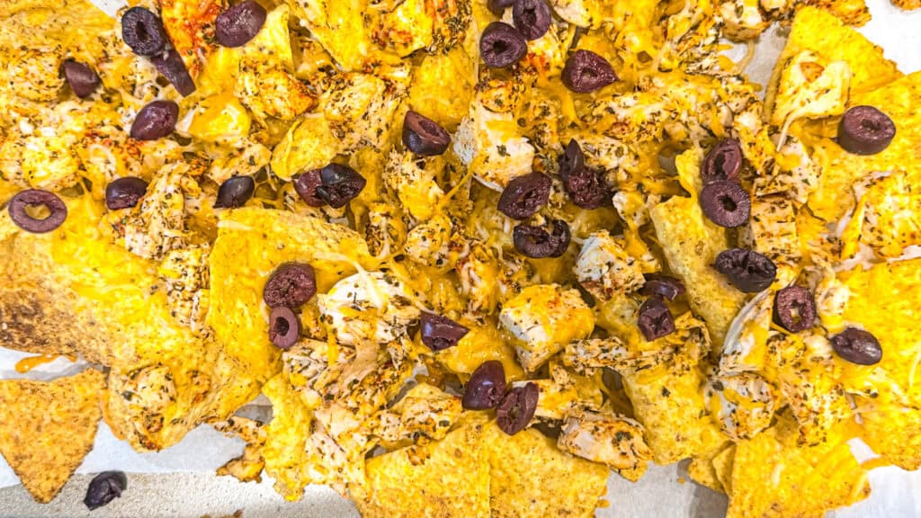 Mediterranean chicken nachos before baking