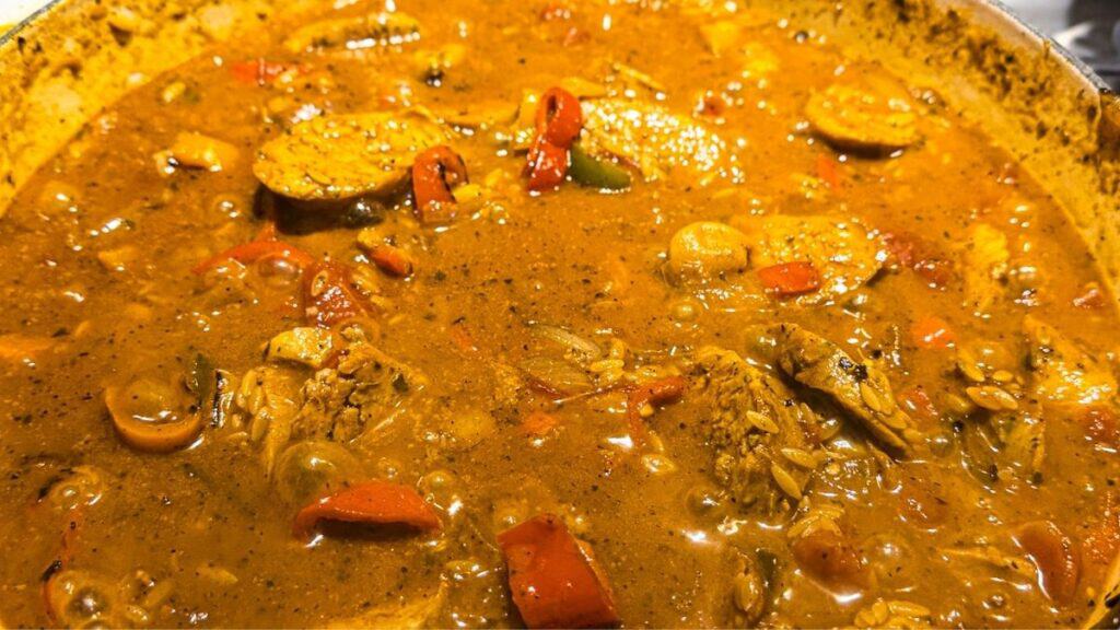 Sausages with Peppers cooking with orzo