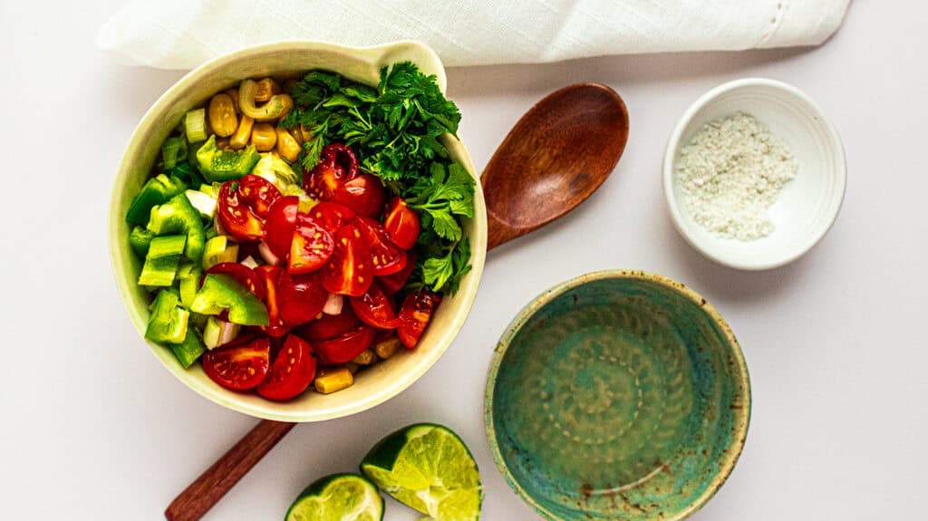 Vibrant vegetable salad with cherry tomatoes, cucumbers, and greens for healthy eating.