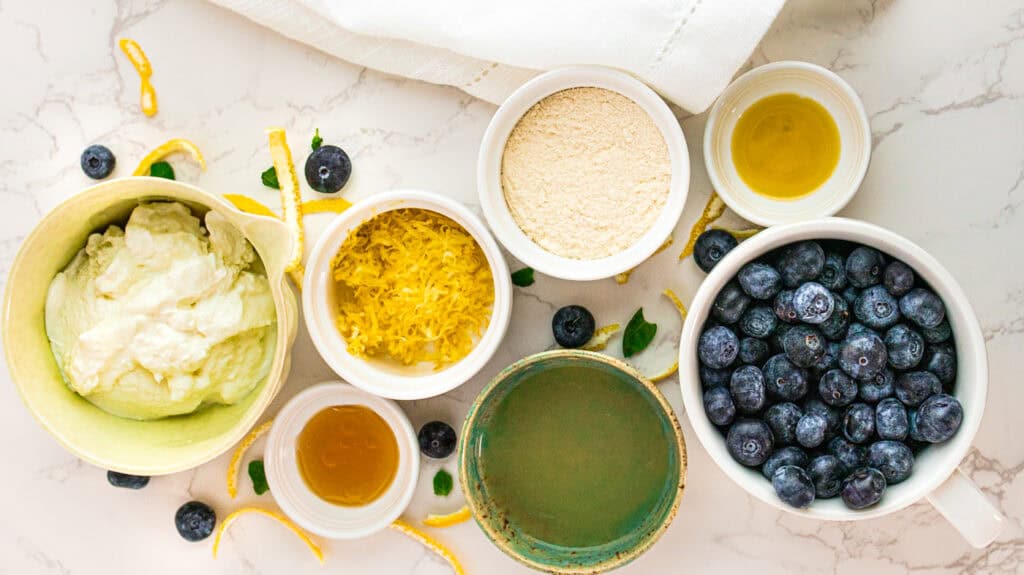 Fresh blueberries, lemon zest, and baking ingredients