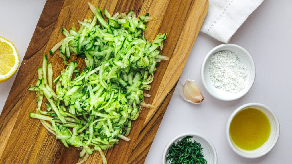 Healthy shredded zucchini for cooking and meal prep.