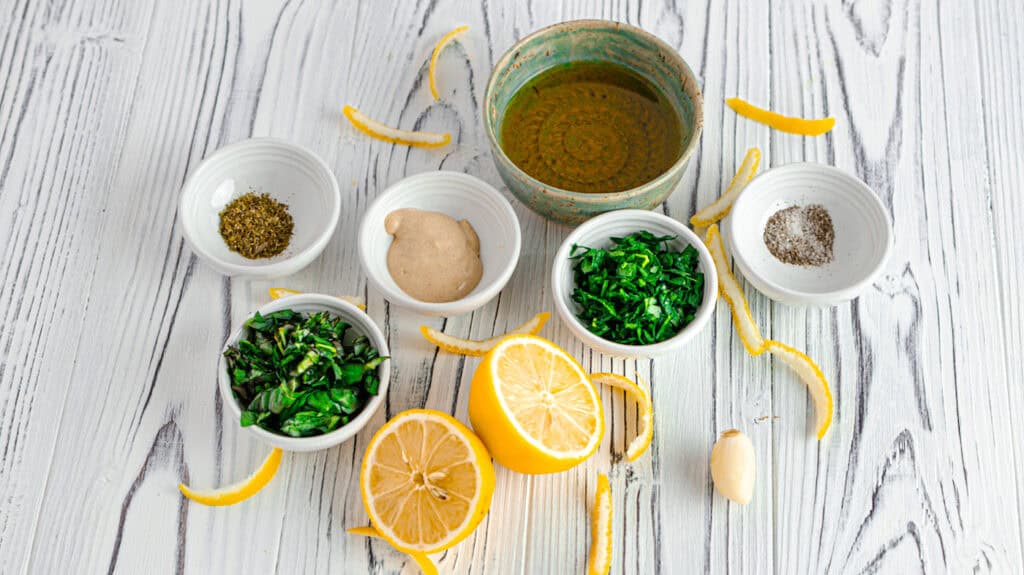Mediterranean lemon-orange herb dressing ingrediens flatlay