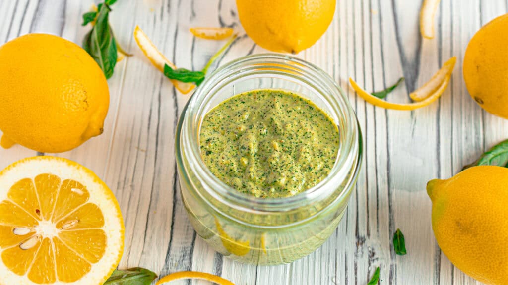 pesto on a board in a jar